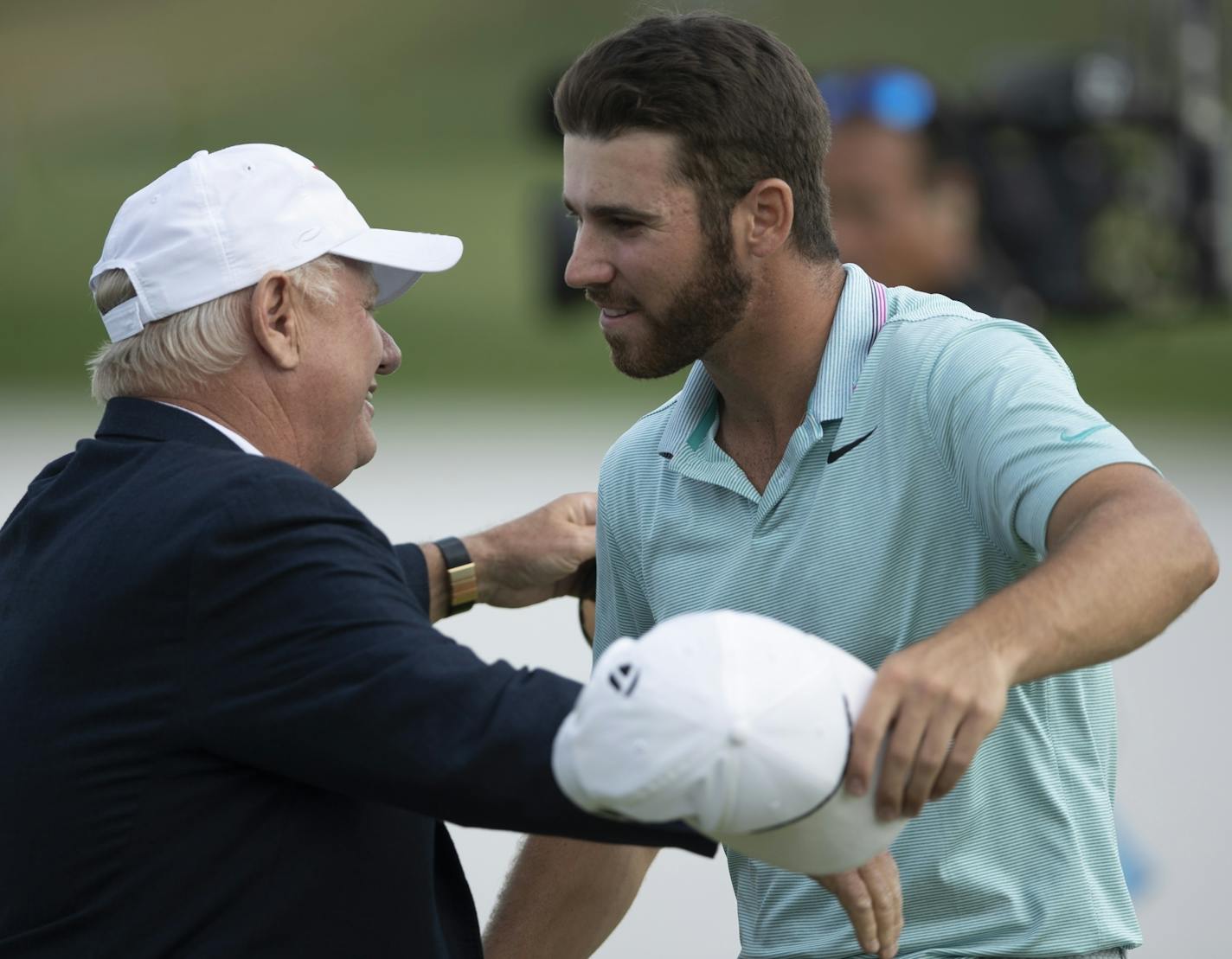 Matthew Wolff hugged Hollis Cavner after winning the 3M Open last year.