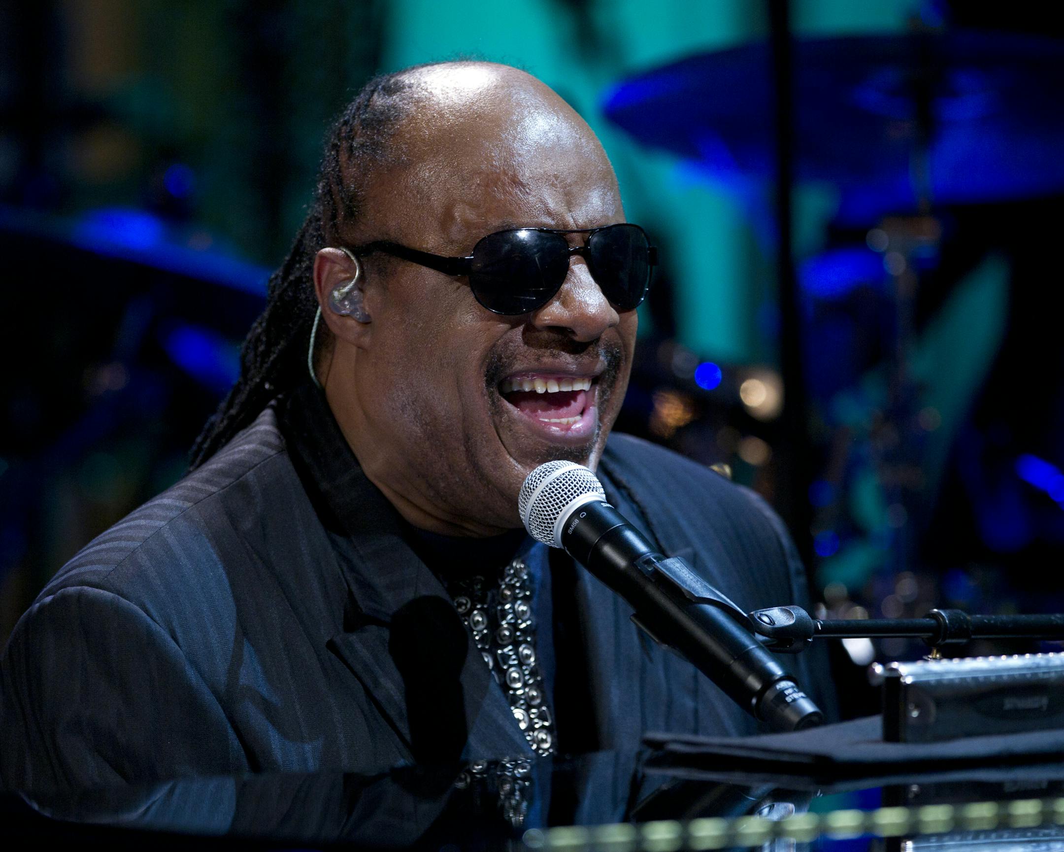 FILE - In this May 9, 2012 file photo, Stevie Wonder performs during the "In Performance at the White House" in the East Room of the White House in Washington, honoring songwriters Burt Bacharach and Hal David. Stevie Wonder is ending his 11-year marriage to fashion designer Kai Millard Morris. A spokeswoman for the musician says Wonder filed for divorce Friday, August 3, 2012, in Los Angeles Superior Court. (AP Photo/Carolyn Kaster, File)