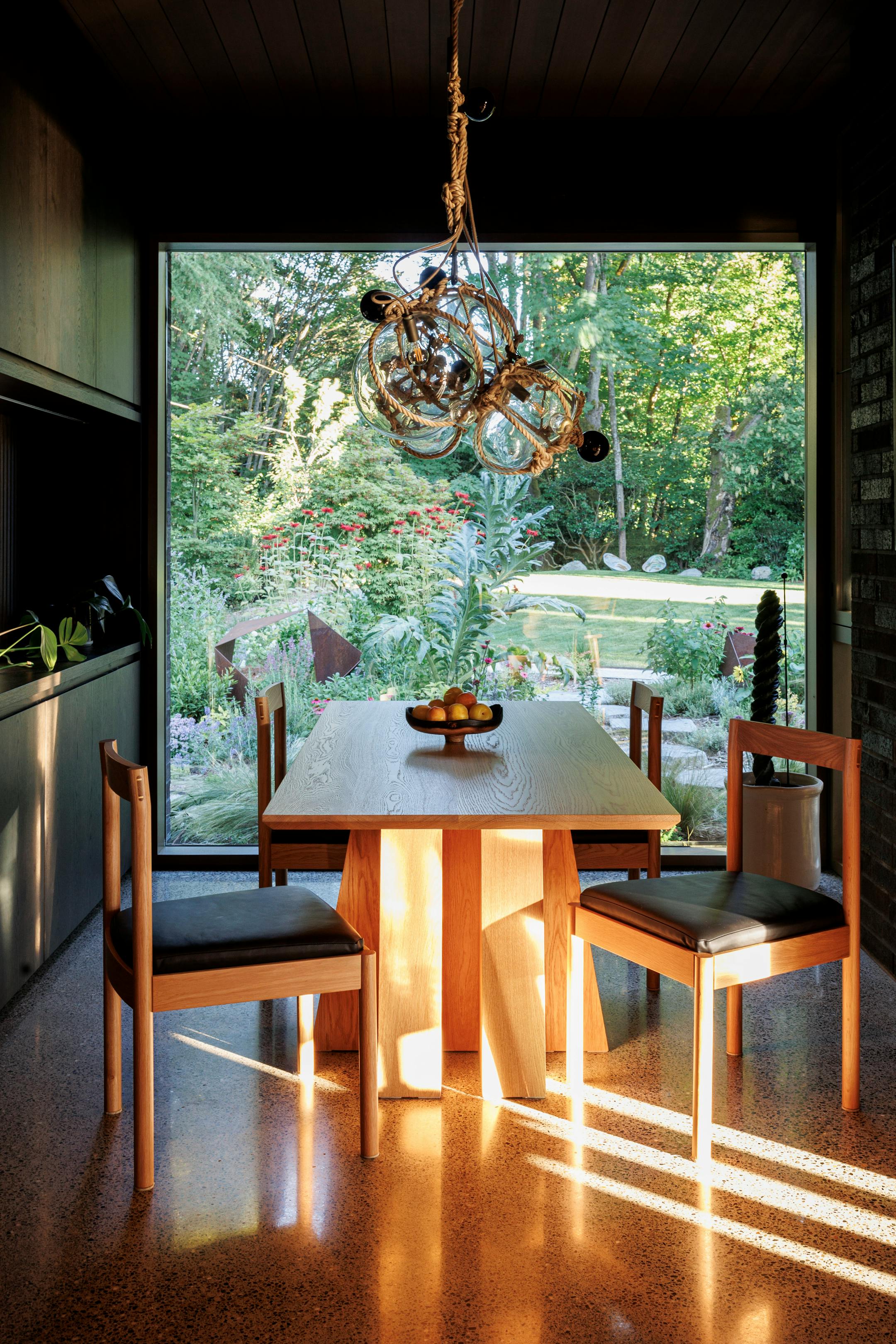The kitchen of a home built in 1933 and now designated as a historical landmark, on Puget Sound in Seattle's Ballard neighborhood, on Aug. 3. 2023. New owners found a way to marry a contemporary kitchen extension to the Scandinavian vernacular architecture of the house, built by a Norwegian sea captain as a replica of his childhood home. (Brooke Fitts/The New York Times)