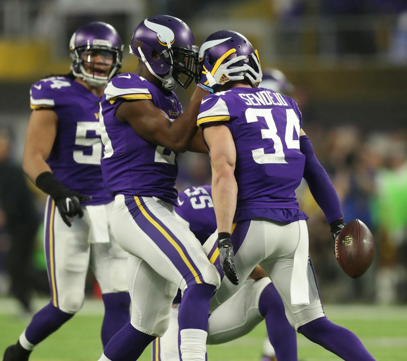 Vikings cornerback Xavier Rhodes, left, congratulated safety Andrfew Sandejo after Sandejo's first-quarter interception of a Drew Brees pass intended for Ted Ginn Jr. in Sunday's NFC divisional playoff game against the New Orleans Saints. ] JEFF WHEELER &#xd4; jeff.wheeler@startribune.com The Minnesota Vikings faced the New Orleans Saints in an NFL divisional playoff game Sunday afternoon, January 14, 2018 at U.S. Bank Stadium in Minneapolis.