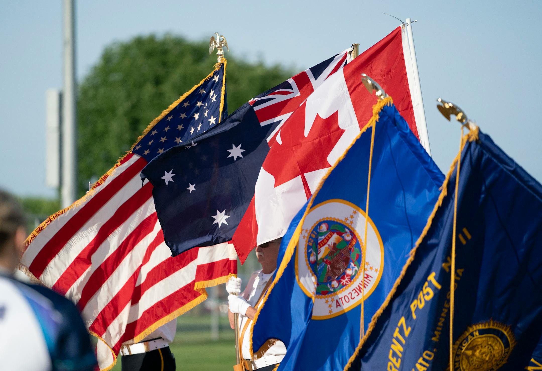The U.S.A, Canadian and Australian flags were brought out during the National Anthems during a game between the Aussie Peppers and the Canadian Wild in North Mankato, Minn. Wednesday, July 3, 2019. ] RENEE JONES SCHNEIDER ¥ renee.jones@startribune.com