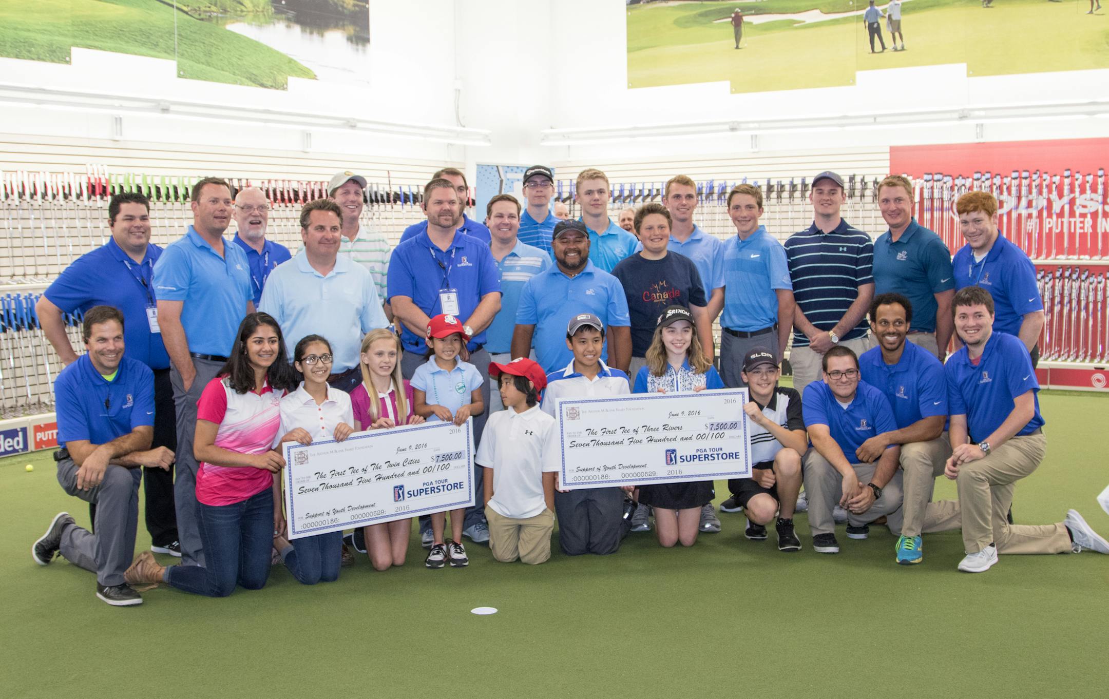 Representatives from The First Tee of the Twin Cities and The First Tee of Three Rivers receive their checks ($7,500 each) at the ribbon cutting ceremony of the PGA Tour Superstore on June 9, 2016 at the PGA Tour Superstore in Minnetonka, Minn. ] Special to Star Tribune, Matt Blewett | matt@mattebphoto.com, Matte B Photography, PGA Tour Superstore, FACE062816 Saxo 846516