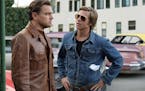 Rick Dalton (Leonardo DiCaprio), left, and Cliff Booth (Brad Pitt) in 'Once Upon a Time in Hollywood.' (Columbia Pictures/TNS) ORG XMIT: 1516734