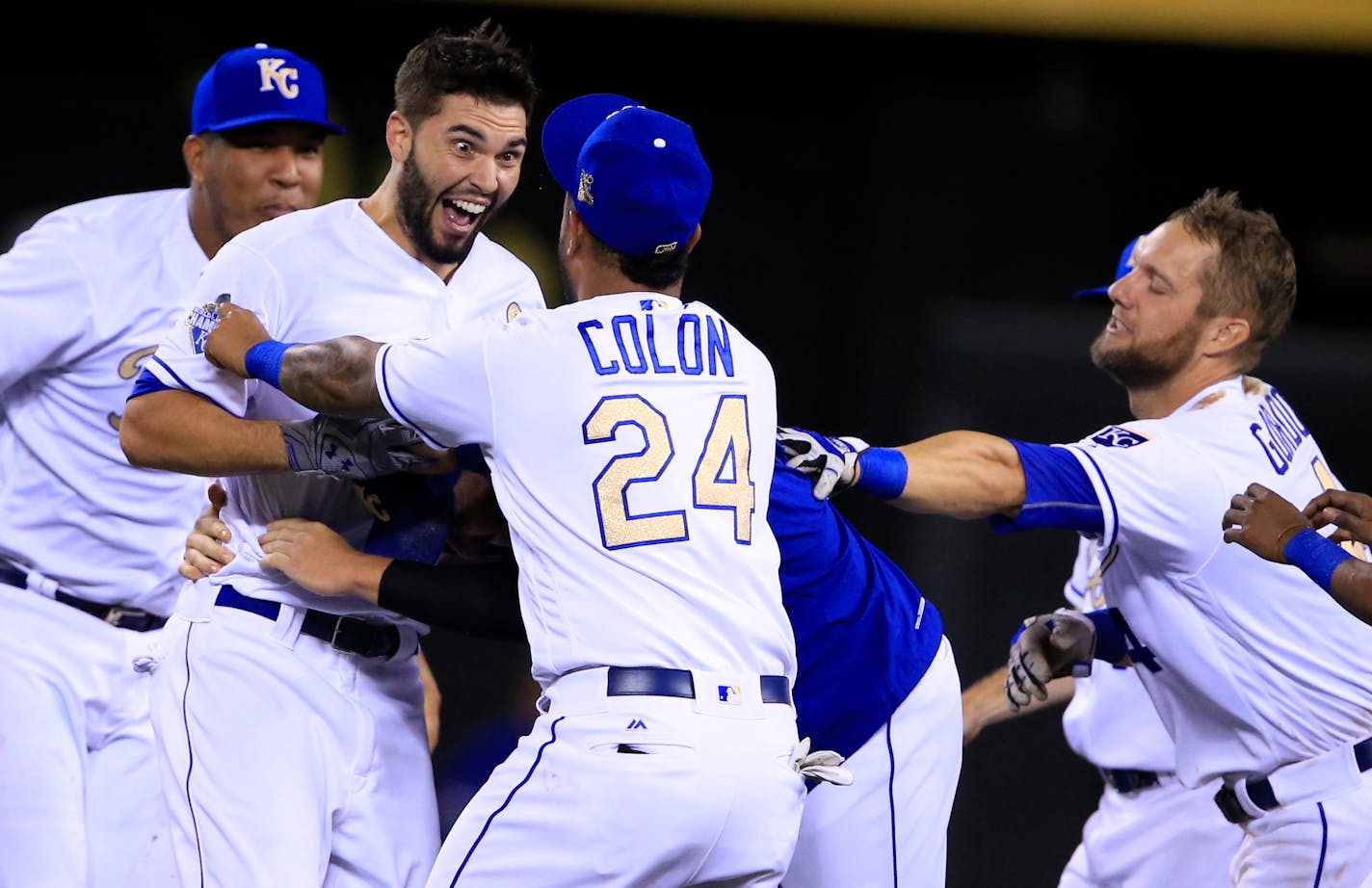 Kansas City Royals' Eric Hosmer smiles big while celebrating with teammates following a baseball game against the Minnesota Twins at Kauffman Stadium in Kansas City, Mo., Saturday, Aug. 20, 2016. Hosmer drove in the winning run. The Royals defeated the Twins 5-4 in 11 innings. (AP Photo/Orlin Wagner)