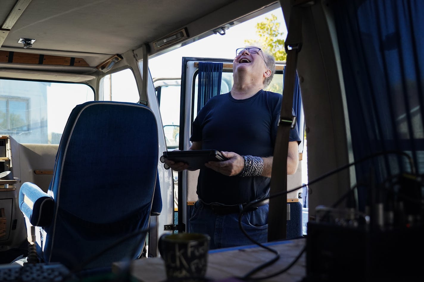 Stuart DeVann laughed as he looked up onto the roof stage where Carly Beseman was helping during a mic check. ] Shari L. Gross ¥ shari.gross@startribune.com "Rock 'n' roll" takes on new meaning with "Bands on Vans," a new concert series on community station MCN6 that takes place on a van with a stage and sidebars built on top of it. The bands perform as the van steadily rolls along at 5 mph max, starting at Grumpy's and ending at the 331 Club in Northeast Minneapolis (both bars are sponsors of t