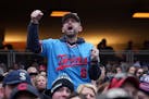 Twins fans cheer during their home opener against the Cleveland Guardians Thursday, April 4, 2024 at Target Field in Minneapolis.  ] ANTHONY SOUFFLE �