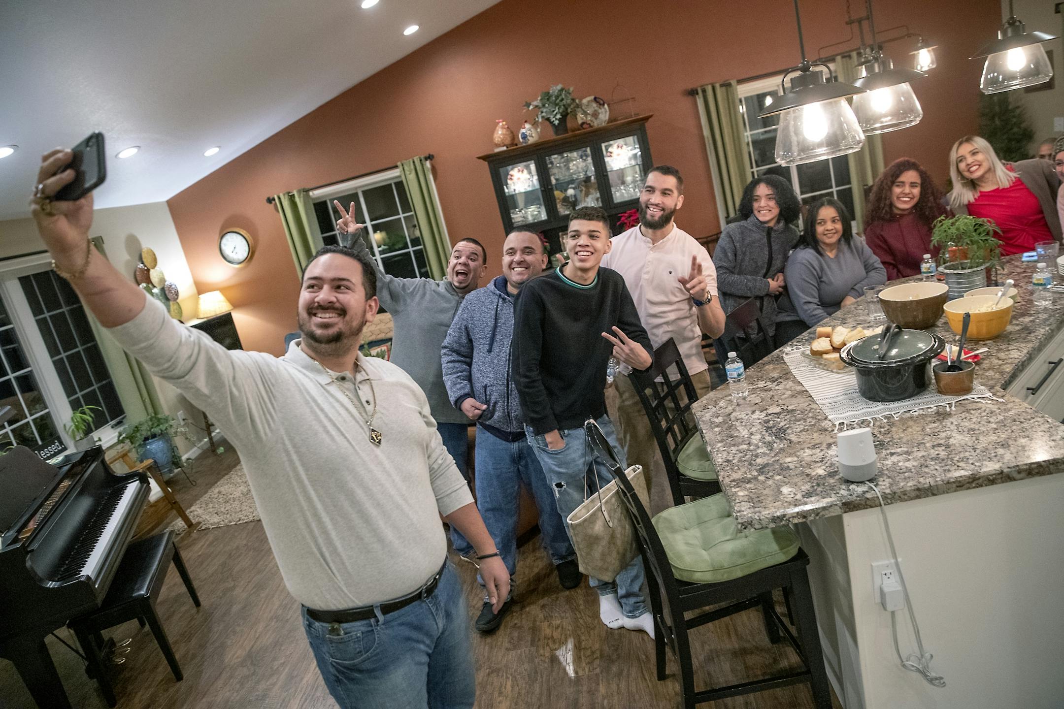Jonathan Zayas, who was a popular chef in Puerto Rico, went live on his smartphone from the home Pastor Steve Hoffer and his wife Mary as they gathered for a dinner with other Puerto Rican families, Sunday, February 16, 2020 in Roseau, MN.