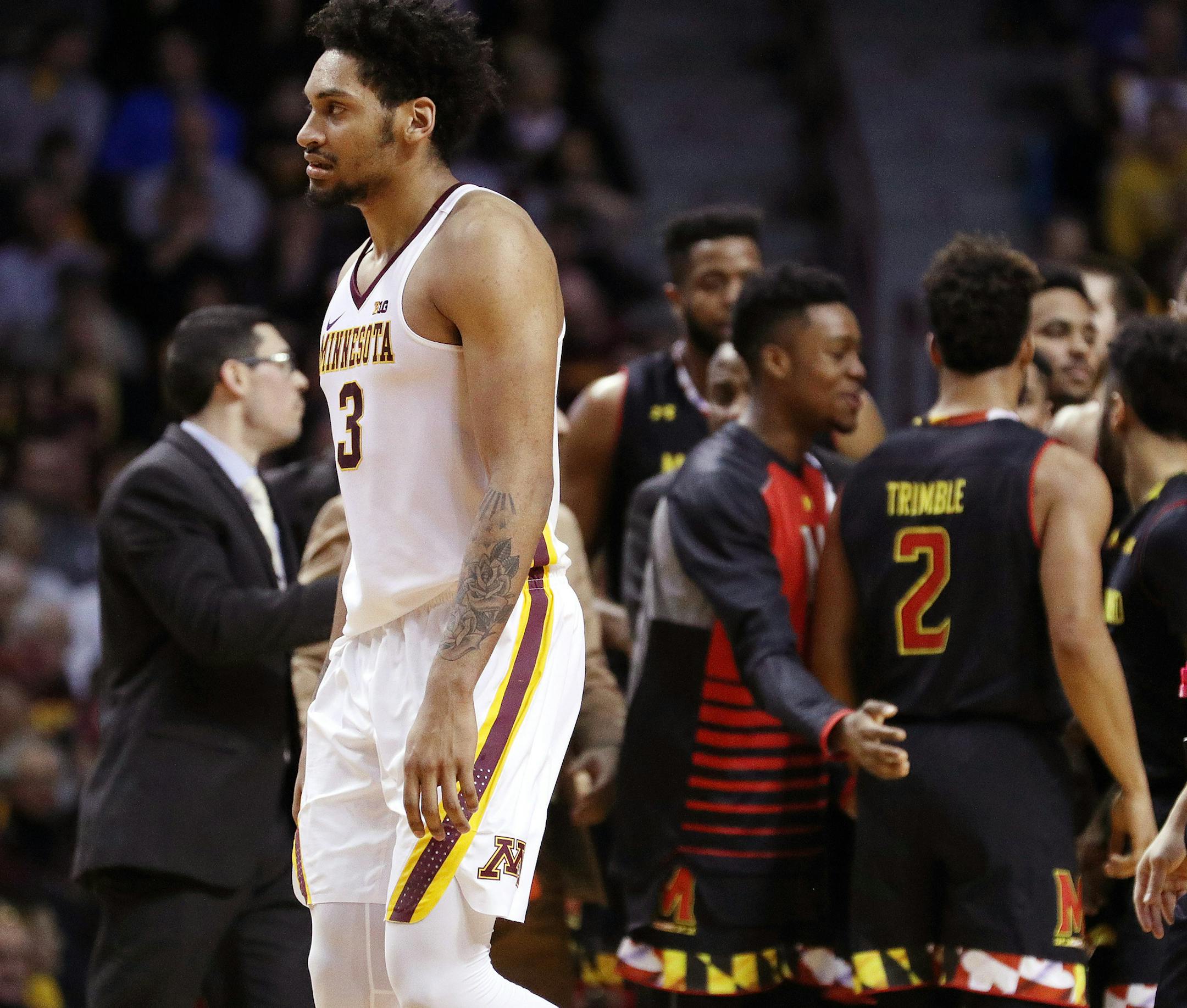 Minnesota Golden Gophers forward Jordan Murphy (3) bites his lip as he walks to the bench for a timeout after the Minnesota Golden Gophers lost the lead during the second half. ] ANTHONY SOUFFLE &#x2022; anthony.souffle@startribune.com Game action from an NCAA basketball game between the Minnesota Golden Gophers and the Maryland Terrapins Saturday, Jan. 28, 2017 at Williams Arena on the grounds of the University of Minnesota in Minneapolis.