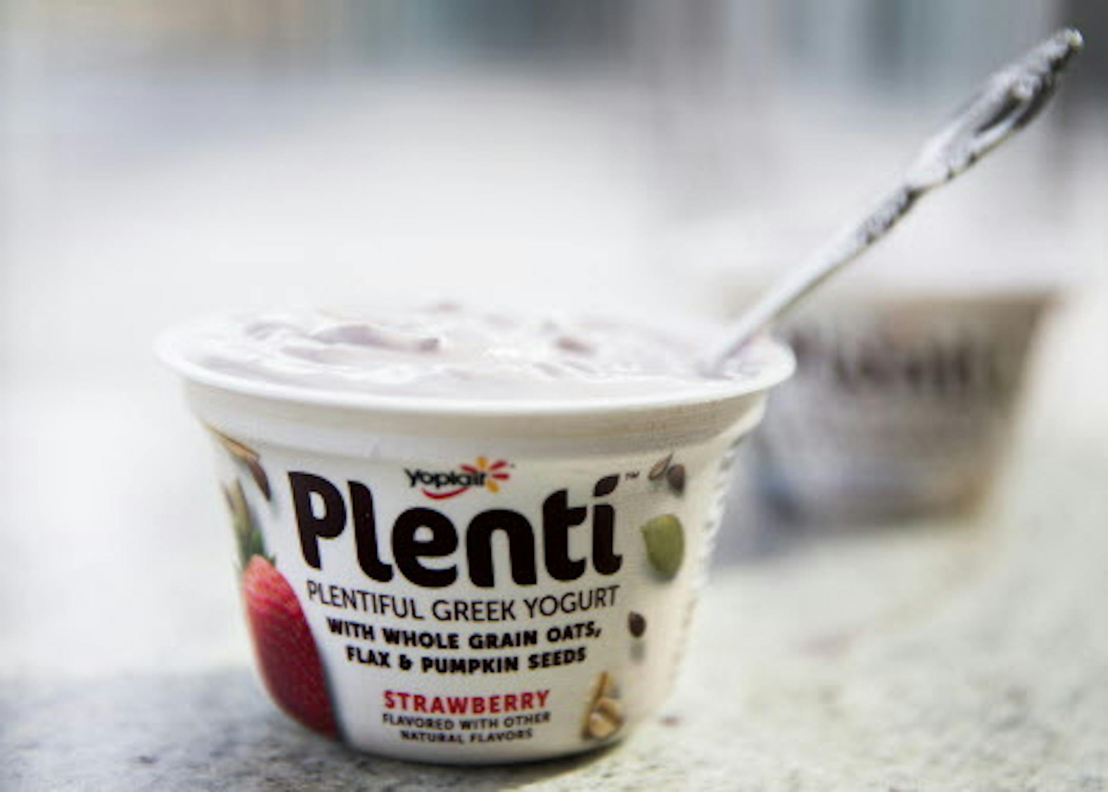 A new product from Yoplait called Plenti, a Greek yogurt with oats, nuts and seeds blended in at General Mills headquarters in Golden Valley on Thursday, March 12, 2015. ] LEILA NAVIDI leila.navidi@startribune.com /