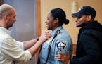 New Police Sergeant Alice White got a little help from friends and fellow officers Steve Sporny and Jon Edwards. They all started in the department in