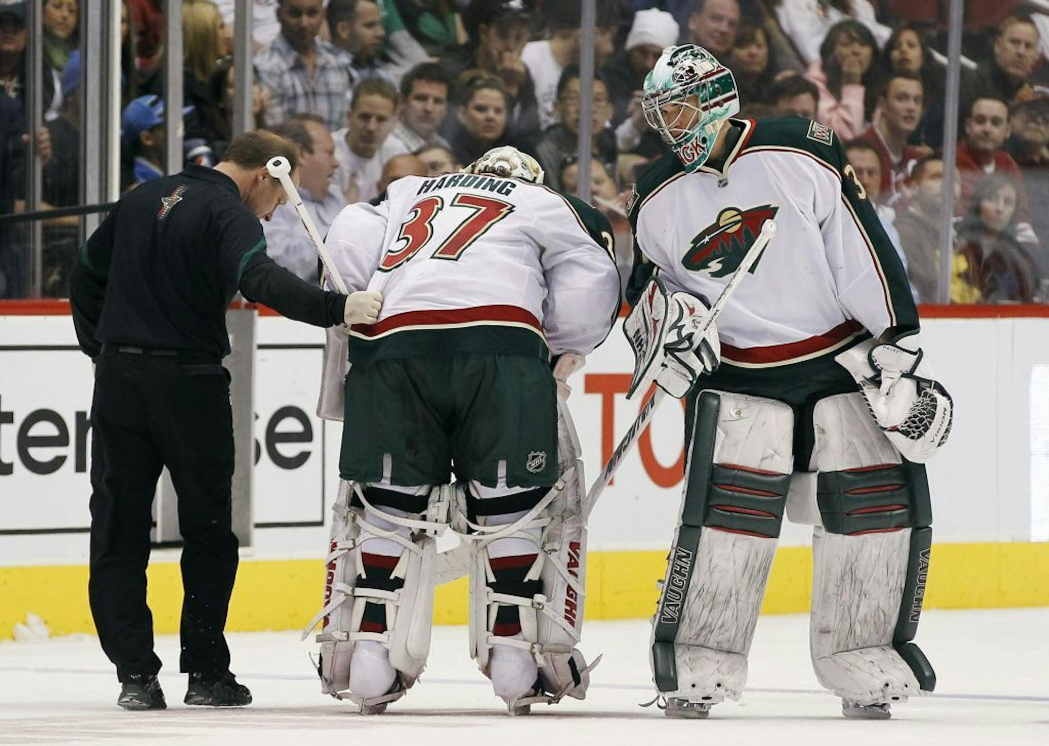 Don Fuller tended to Wild goalie Josh Harding.