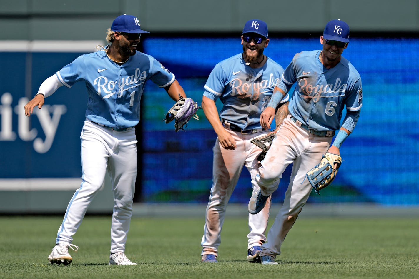 Kansas City Royals outfielders MJ Melendez (1), Kyle Isbel, center, and Drew Waters (6) celebrate after their baseball game against the Los Angeles Dodgers Sunday, July 2, 2023, in Kansas City, Mo. The Royals won 9-1. (AP Photo/Charlie Riedel)