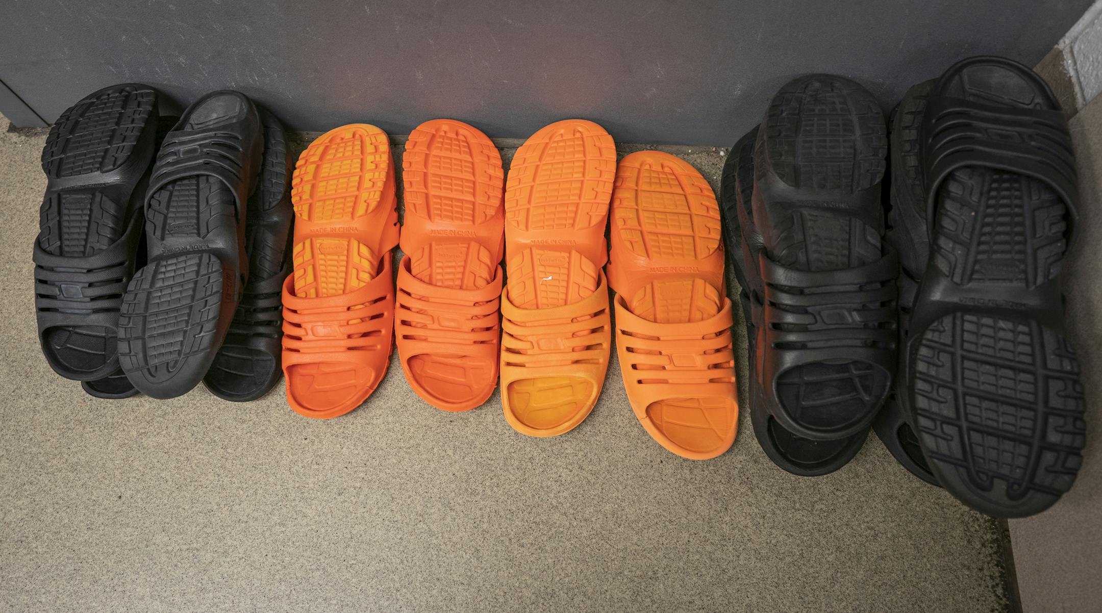 Stacks of jail-issued footwear are seen in the intake area of the Hennepin County Jail. ] LEILA NAVIDI &#xa5; leila.navidi@startribune.com BACKGROUND INFORMATION: The Hennepin County Jail in downtown Minneapolis seen on Tuesday, April 23, 2019. The Hennepin County Jail will be participating in the Doors Open Minneapolis event. ORG XMIT: MIN1904231801362083