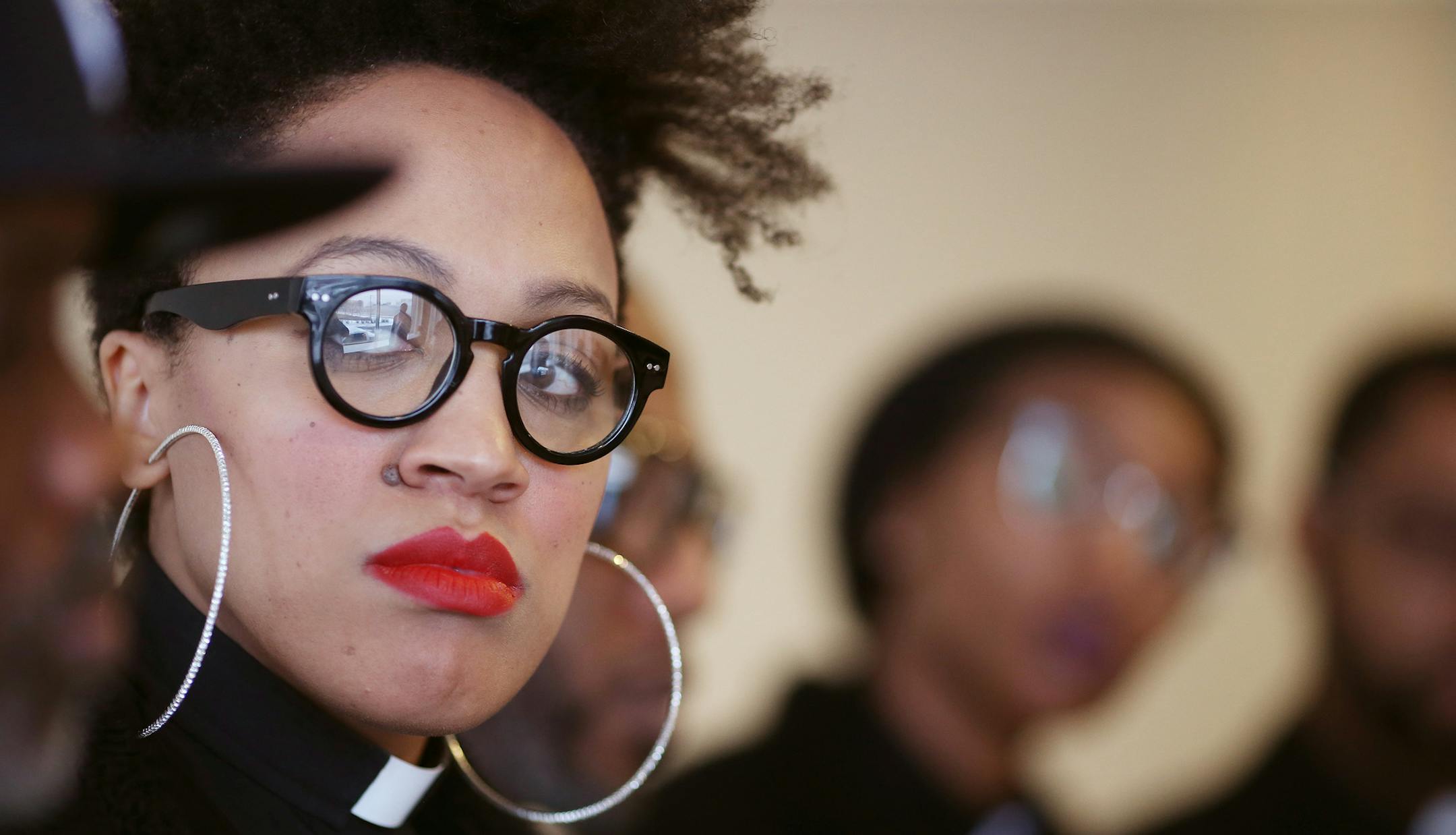 Elle Babington Steele (with glass) was flanked by Twin Cites Pastors Carmen Means left, Stacey Jones, Danny Givens Jr., Dee Jackson-McIntosh and Victor Wilson Thursday January 21, 2016 in Minneapolis, MN. ] Black Clergy United for Change apologized on behalf of the Black church to the larger Black community, specifically to Millennials, the Black LBGTQ community, and many others marginalized and neglected segments within the urban communities. Jerry Holt/Jerry.Holt@Startribune.com