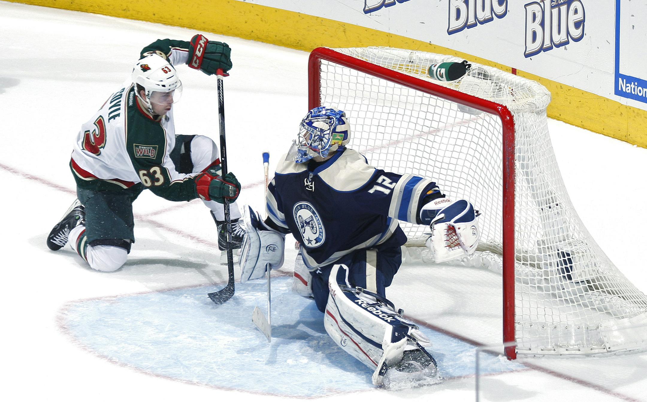 Minnesota Wild right wing Charlie Coyle (63) sneaks a goal past Columbus Blue Jackets goalie Sergei Bobrovsky (72) in the second period at Nationwide Arena in Columbus, Ohio, Sunday, April 7, 2013. The Minnesota Wild defeated the Columbus Blue Jackets, 3-0. (Eamon Queeney/Columbus Dispatch/MCT)
