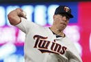 Minnesota Twins pitcher Trevor May throws to a Detroit Tigers batter during the fifth inning of a baseball game Thursday, Aug. 16, 2018, in Minneapoli