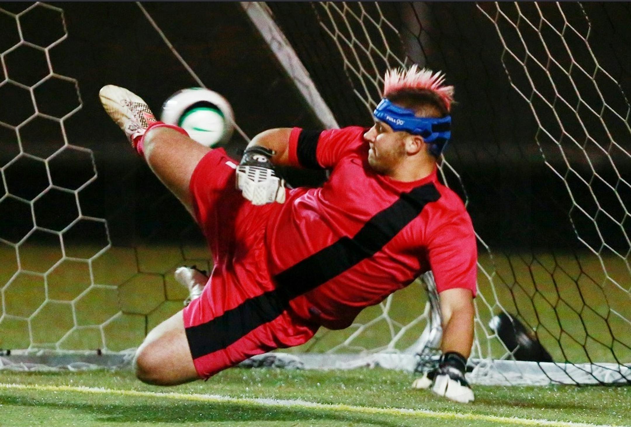 Eagan goalkeeper Dalton Von Kaenel kicks away shot during a shootout with St.Paul Central in the Section 3, 2A championship game