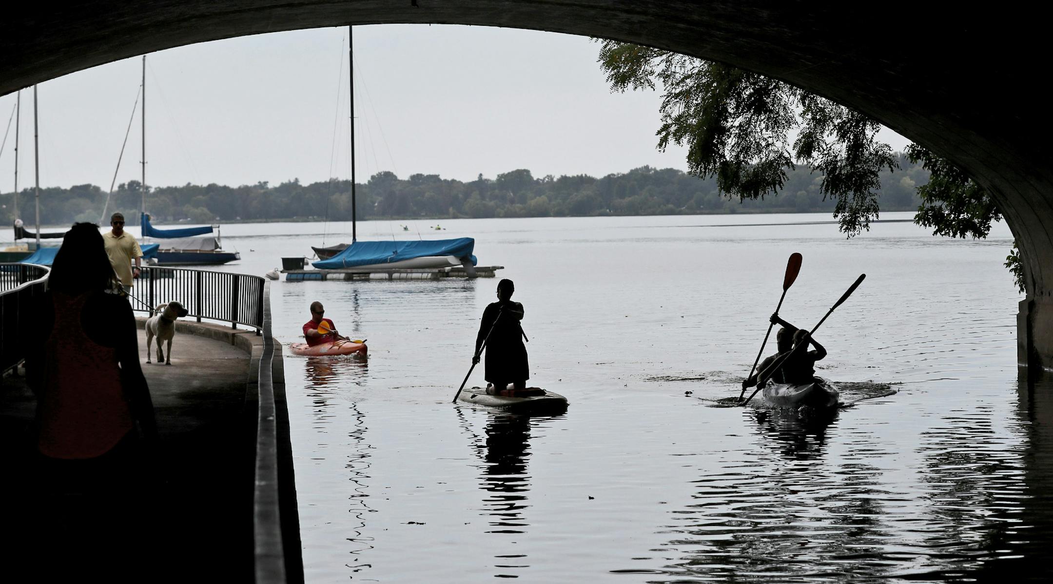 Kayakers, paddle boarders and canines alike enjoyed unseasonably warm temps on and along Bde Maka Ska Friday, Sept. 15, 2017, at Bde Maka Ska/Lake Calhoun in Minneapolis, MN.] DAVID JOLES ï david.joles@startribune.com It's going to reach almost 90 today. And it's the middle of September!**John Nix,cq