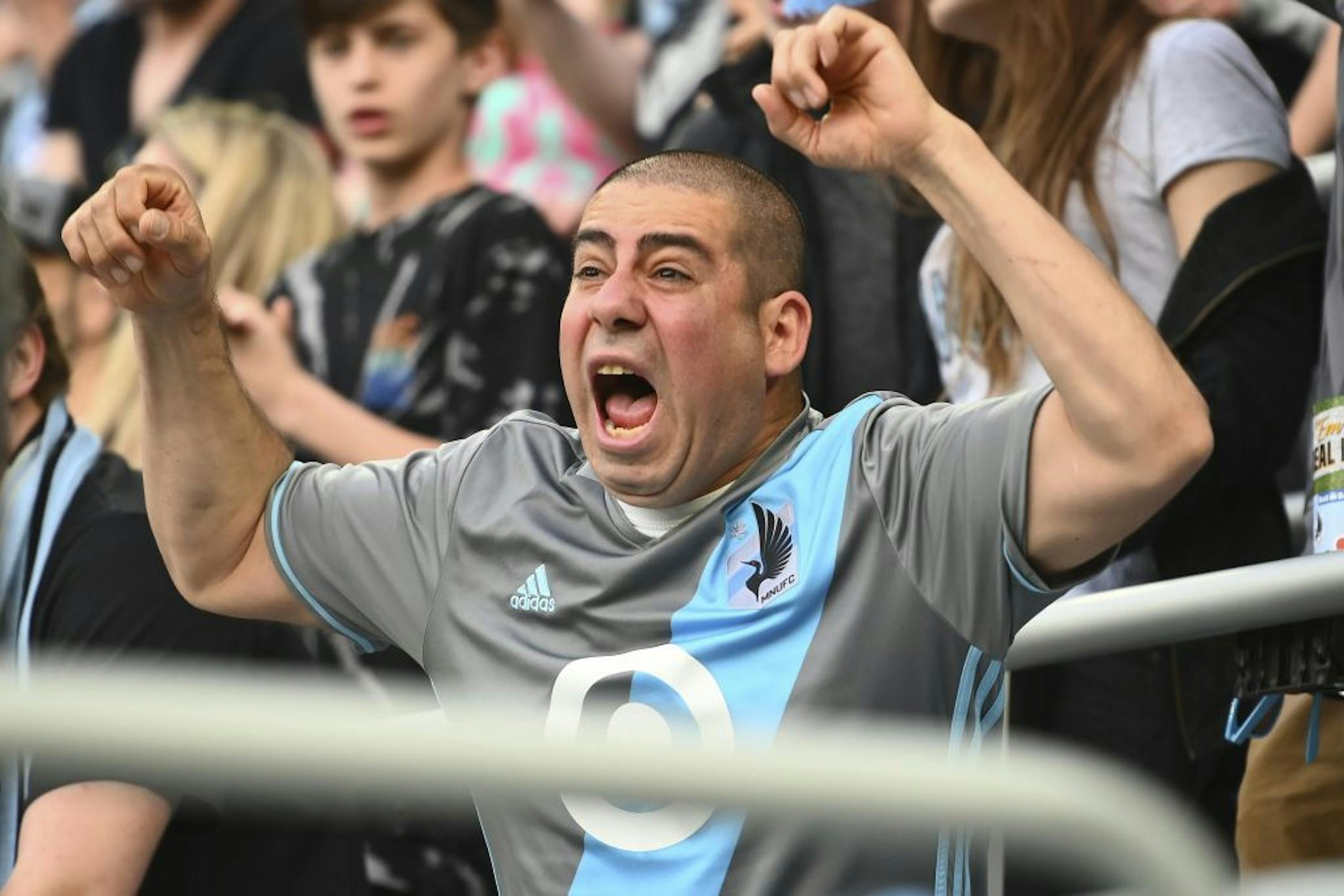 A Minnesota United fan cheered for his team before the start of Saturday night's game against the Seattle Sounders.