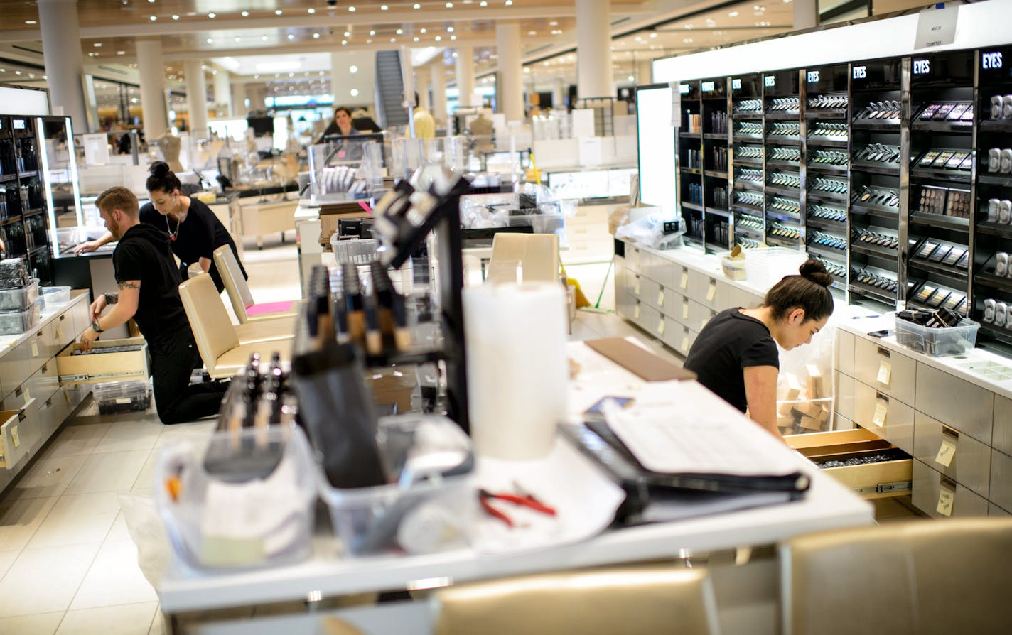 Workers from MAC Cosmetics arranged the display at the new Nordstrom open cosmetics section, Ridgedale, Minnetonka. ] GLEN STUBBE * gstubbe@startribune.com Tuesday September 22, 2015 Nordstrom will open its second Twin Cities' dept. store in Ridgedale on Oct. 2.