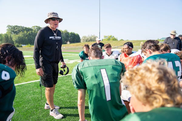 Holy Family coach Dan O’Brien addressed his team after practice Aug. 23.