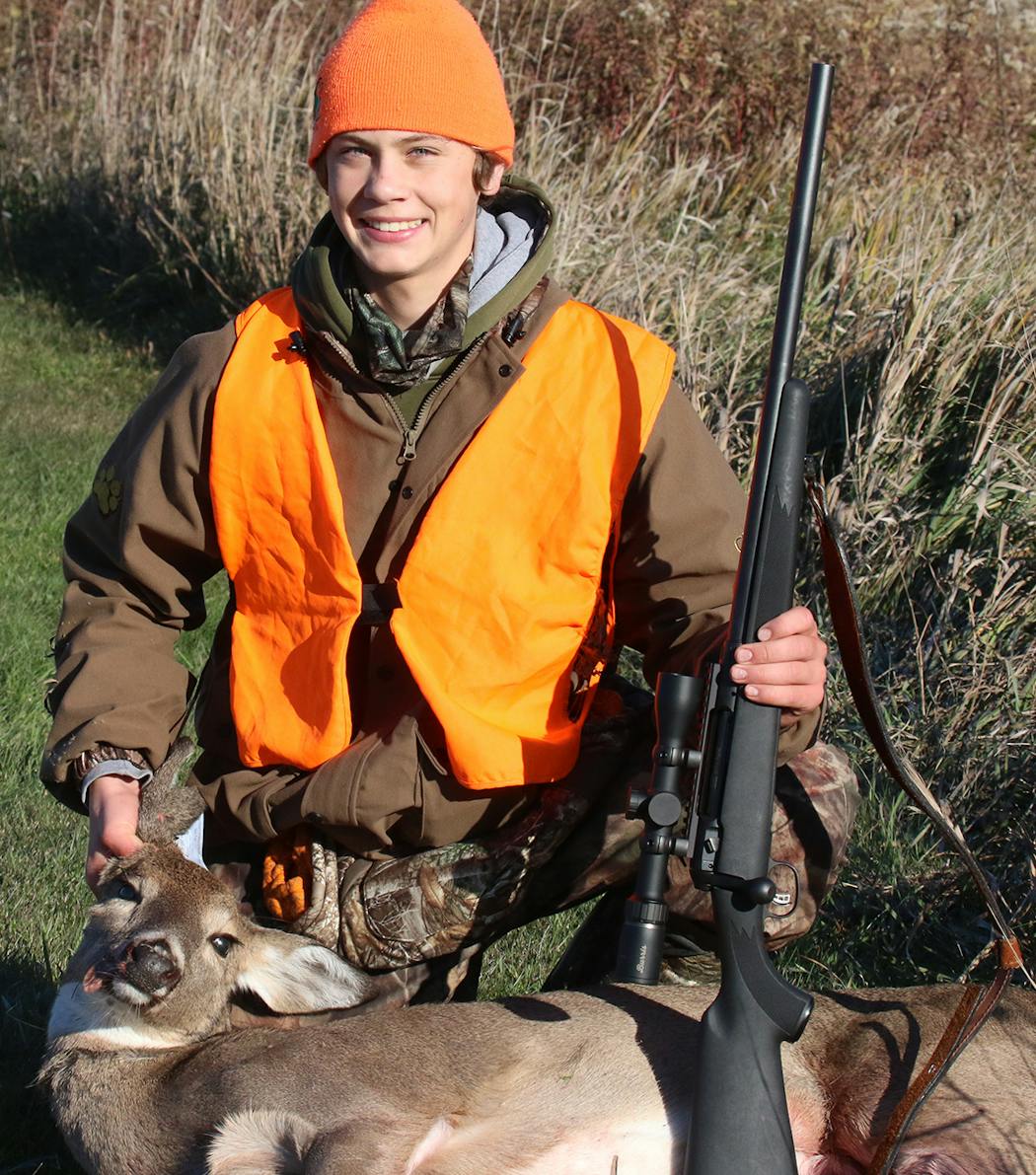 Isaac Joesting, 14, of Wyoming, Minn., with a doe he shot on opening morning during the youth hunt at Afton State Park in Hastings. He used copper ammunition in his bolt-action gun, harvesting the deer with one shot.