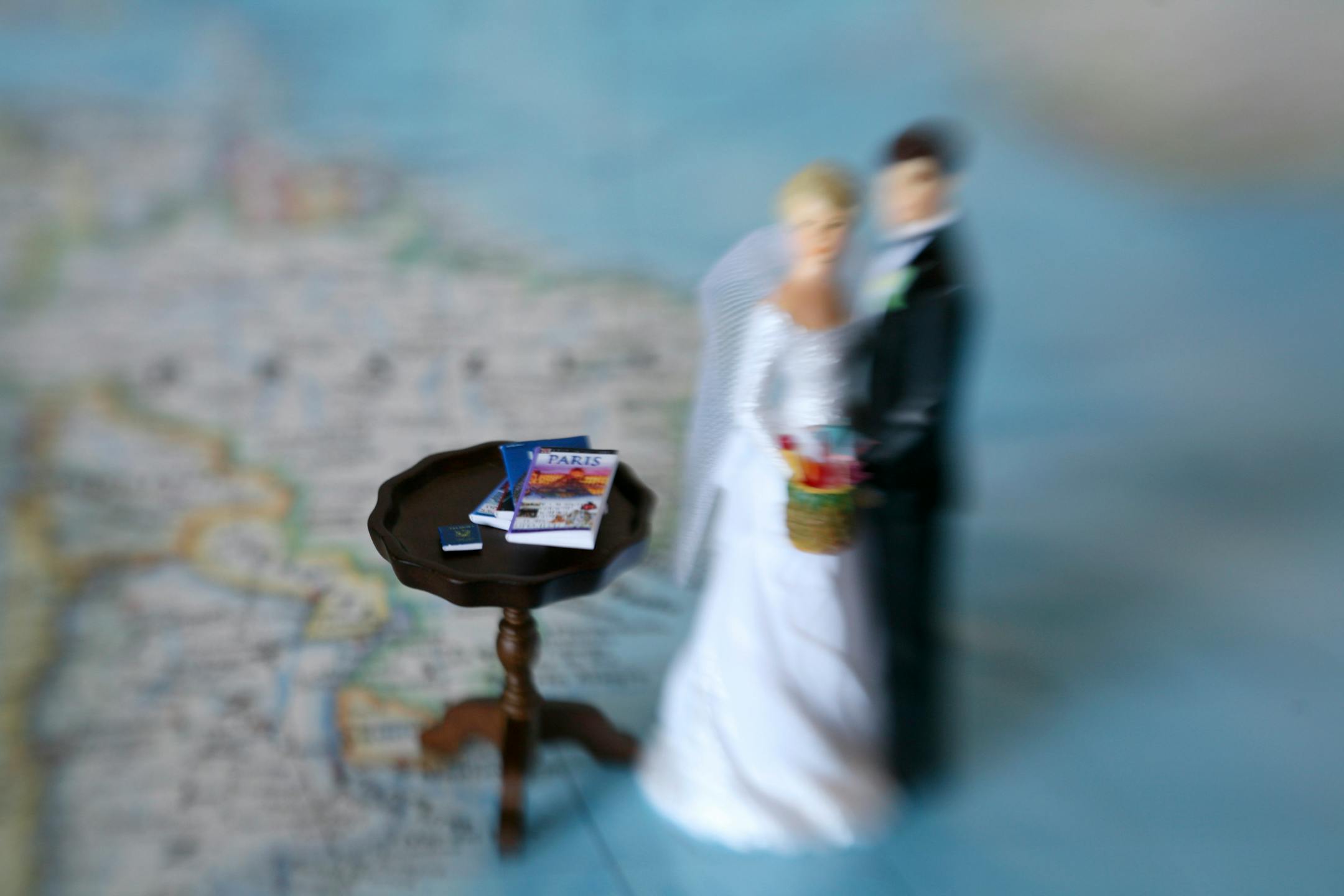 Where in the world do we go now? On honeymoons. Photo illustration