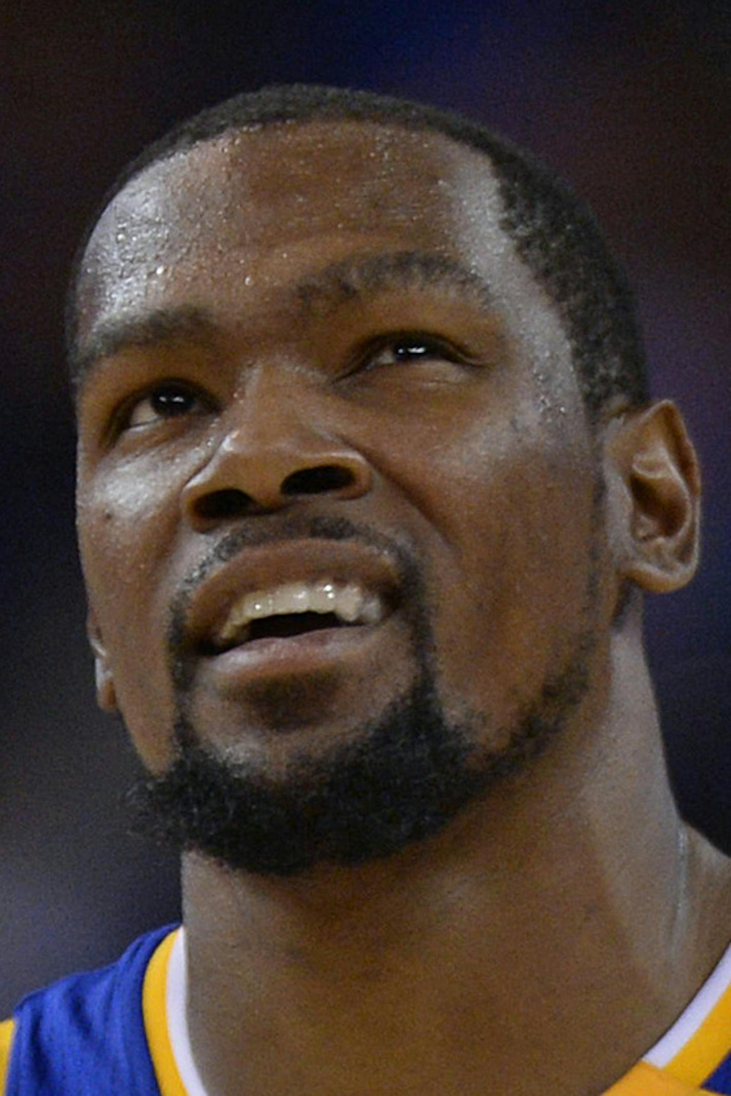 Golden State Warriors' Kevin Durant (35) reacts after a foul is called against his team while playing the Phoenix Suns during the second quarter on Sunday, Nov. 13, 2016 at the Oracle Arena in Oakland, Calif. (Jose Carlos Fajardo/Bay Area News Group/TNS) ORG XMIT: 1193084