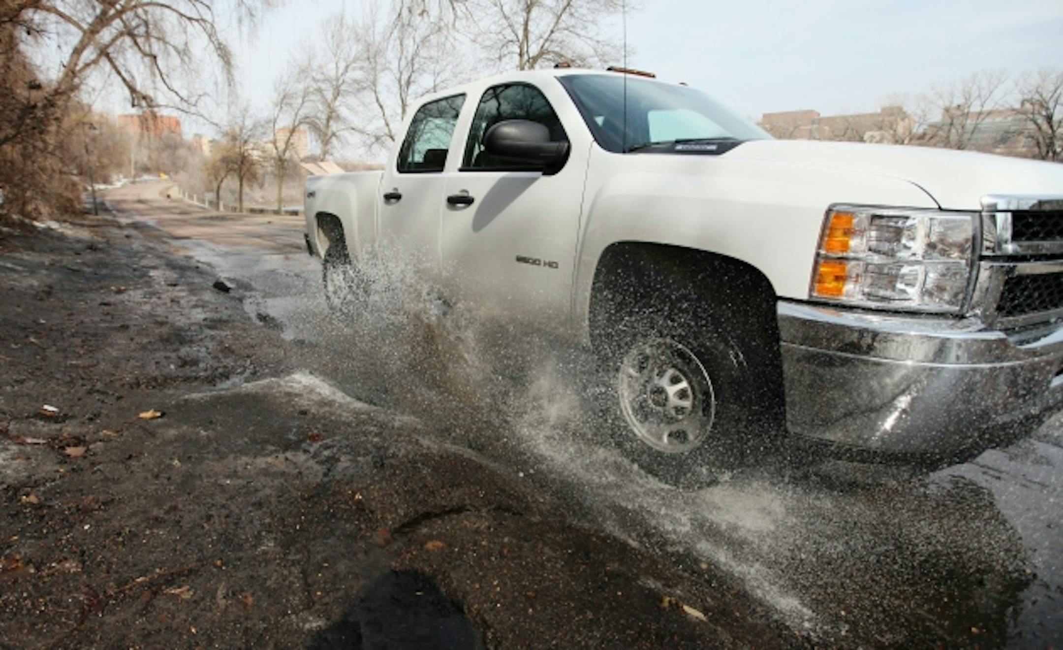 Potholed parkway/ Staff photo by Mark Brunswick