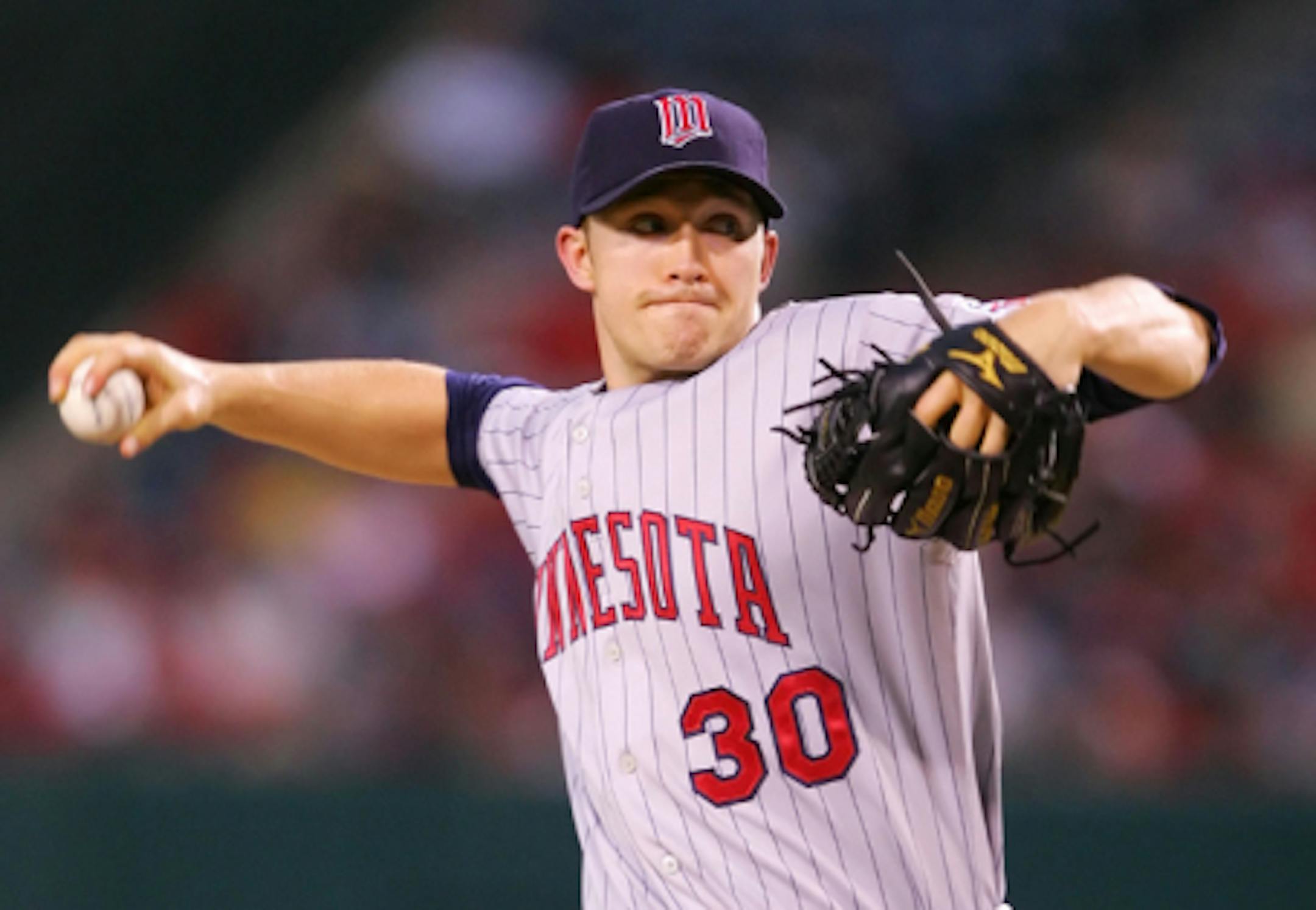 ANAHEIM, CA - AUGUST 21:  Scott Baker #30 of the Minnesota Twins pitches against the Los Angeles Angels of Anaheim at Angels Stadium on August 21, 2008 in Anaheim, California.  (Photo by Lisa Blumenfeld/Getty Images)