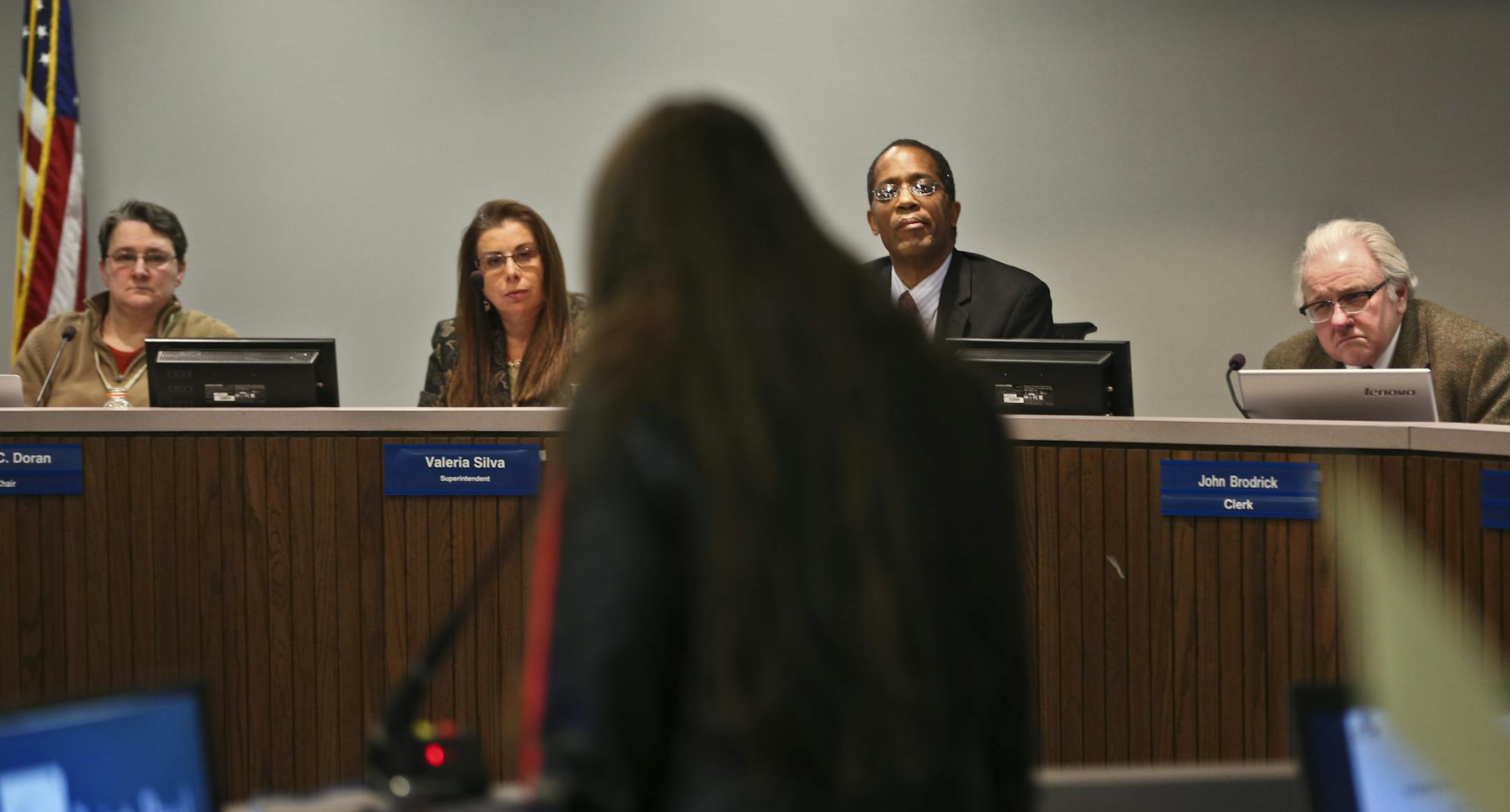 Student Mariah Duncan spoke to the school board about how she has had to sit on the floor in class because her class size was too big. From left: Mary C. Doran, superintendent Valeria Silva, Keith Hardy and John Brodrick.