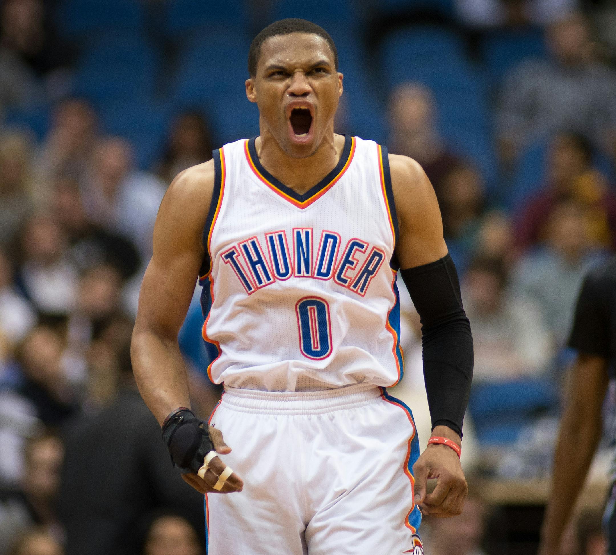 Oklahoma City Thunder guard Russell Westbrook (0) lets out a howl after hitting a three-point shot against the Timberwolves in the second quarter. ] AARON LAVINSKY • aaron.lavinsky@startribune.com The Minnesota Timberwolves take on the Oklahoma City Thunder Friday, Dec. 12, 2014 at Target Center in Minneapolis, Minn.