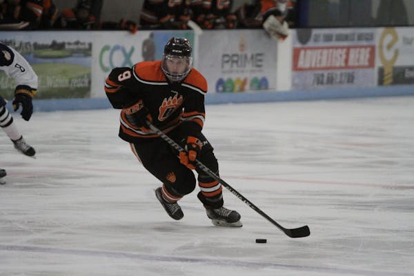 Nolan Roed handled the puck for White Bear Lake on Tuesday in a 5-3 victory over Totino-Grace. White Bear Lake is 15th in the latest Let’s Play Hock