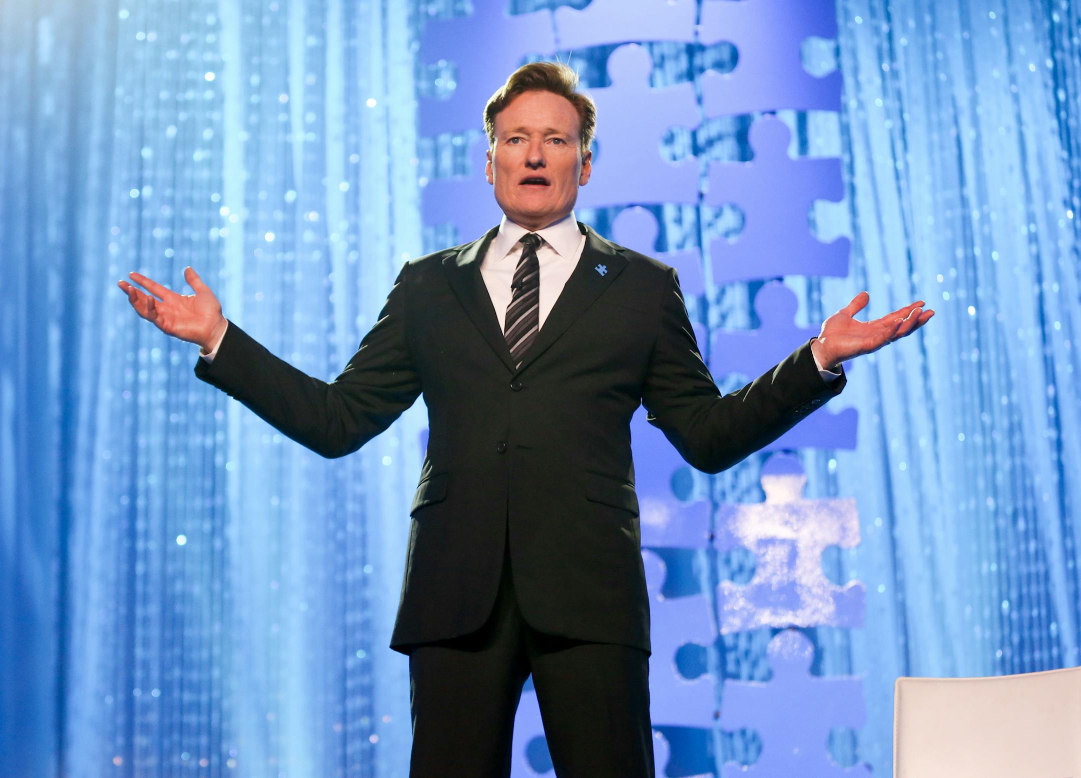 FILE - In this Oct. 8, 2015 file photo, Conan O'Brien speaks at the Autism Speaks to LA Celebrity Chef Gala in Santa Monica, Calif. TBS said Monday, Oct. 12, that O'Brien will host his show from Armenia. The episode will air on Nov. 10. (Photo by Rich Fury/Invision/AP, File)