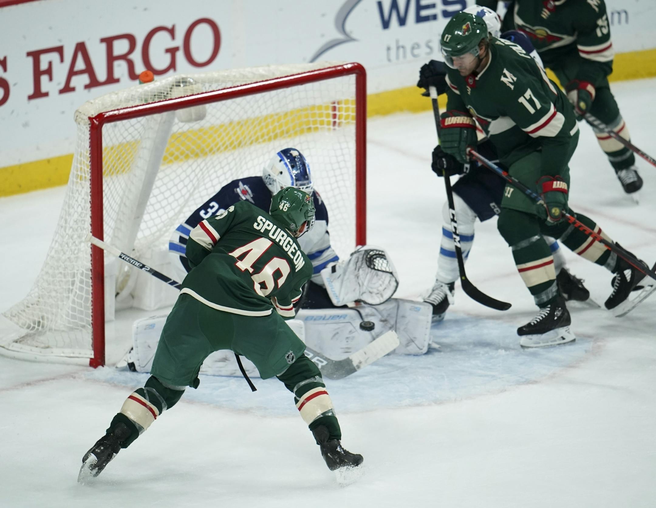 Minnesota Wild defenseman Jared Spurgeon (46) took his game winning shot on Winnipeg Jets goaltender Laurent Brossoit in the third period.