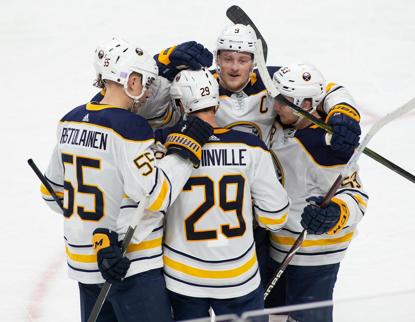 Sabres winger Jason Pominville (29) celebrates the game-winning goal with teammates Rasmus Ristolainen, (55), Jack Eichel (9) and Jeff Skinner (53)