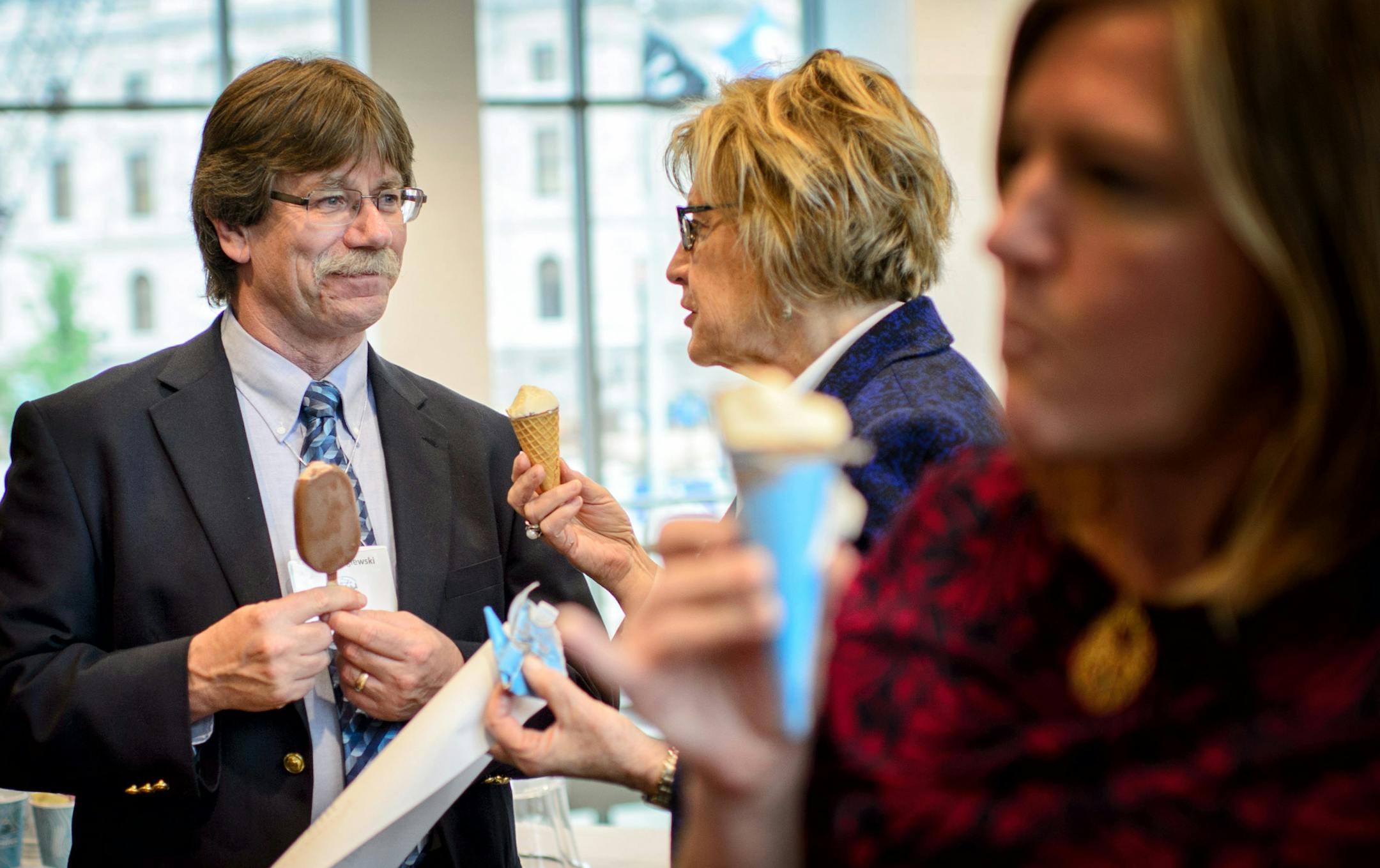Senator Kathy Sheran took a break from Senate tax bill debate to eat ice cream with Granite Falls Mayor Dave Smiglewski in the Senate office building. ] GLEN STUBBE * gstubbe@startribune.com Wednesday, May 11, 2016 Greater Minnesota city leaders came to the Capitol Wednesday to call for the legislature to act on taxes, transpo and bonding, as the Senate considered a tax bill with paid family leave. The Coalition of Greater Minnesota Cities held an ice cream social in the Senate Office Building.