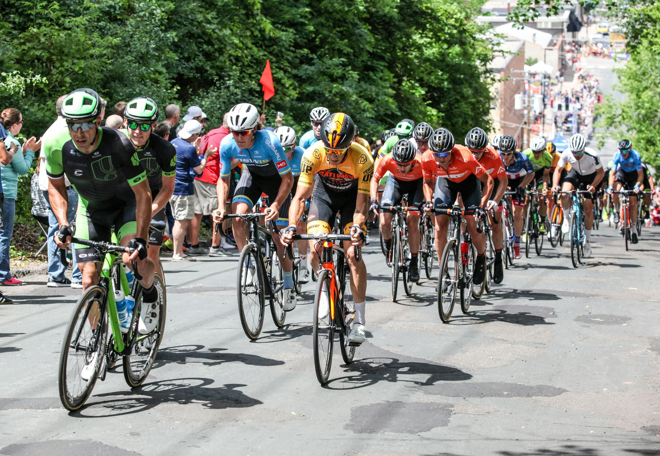 Men cyclists were climbing the most difficult climb in North American cycling, Chilkoot Hill. ] XAVIER WANG • xavier.wtian@gmail.com The final stage of the 2017 North Star Grand PRIX was hosted in Stillwater Sunday June 18, 2017. Women and men cyclists rode multiple laps through downtown Stillwater.