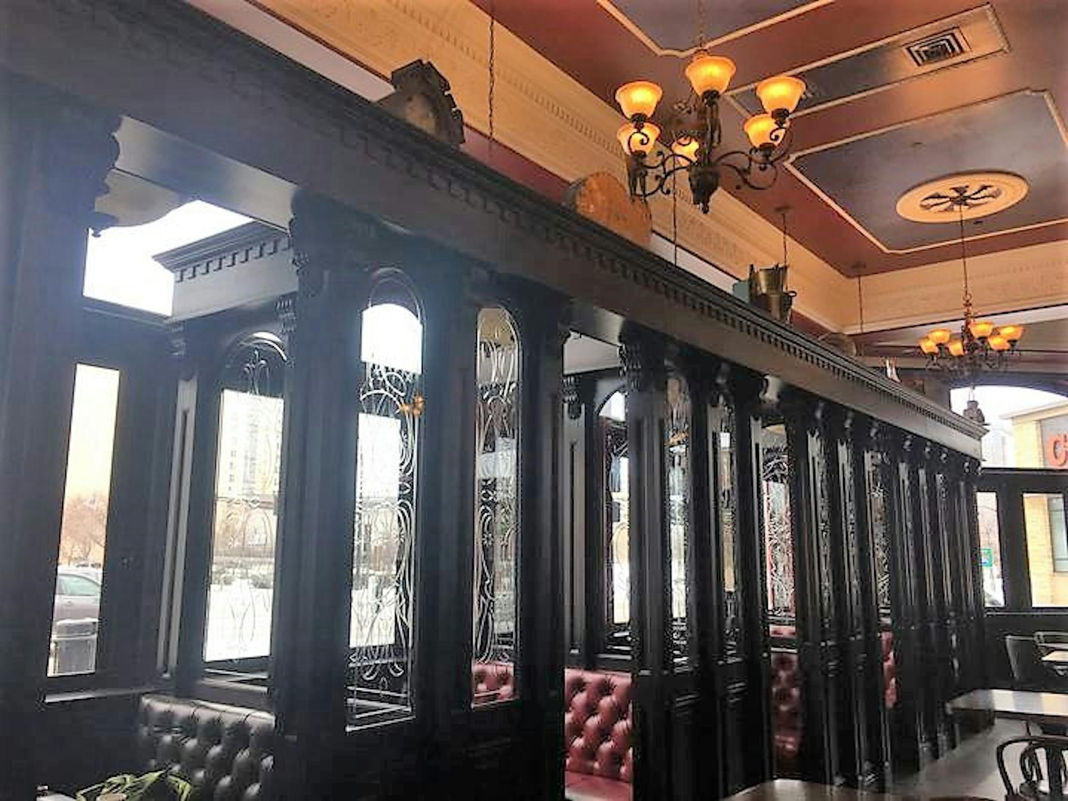 Snugs (booths) line the outer walls of the Local West End.