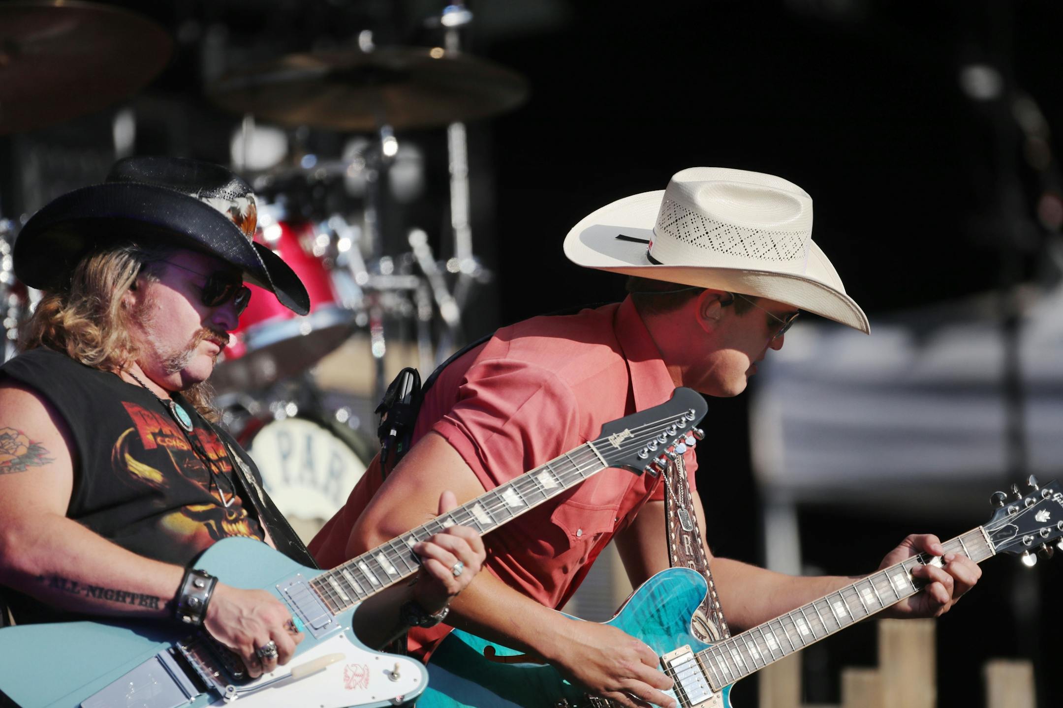 Jon Pardi, right, played guitar while he performed Saturday, July 21, 2018, at Target Field in Minneapolis, MN.