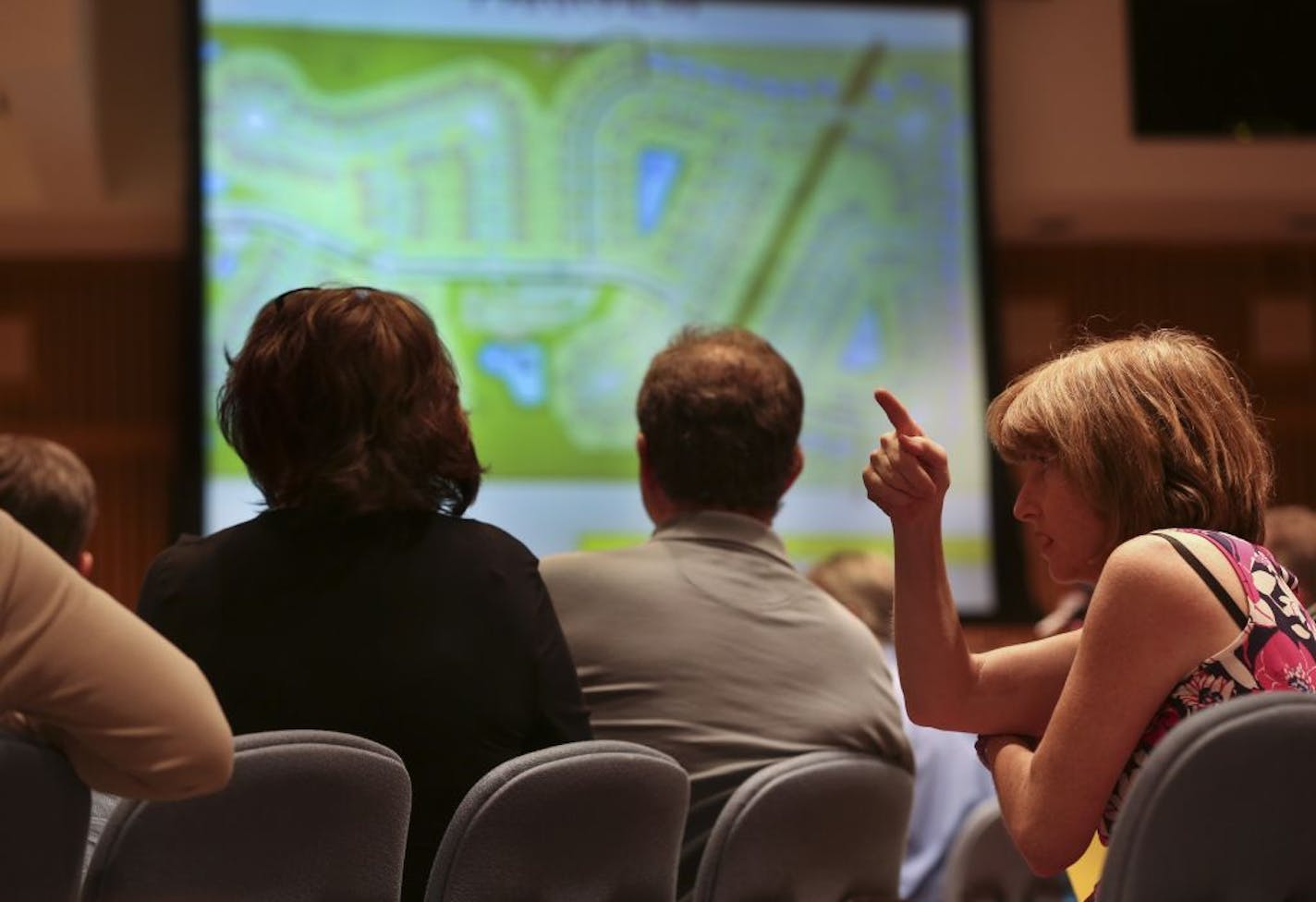 Citizens studied and commented on plans for a 175-unit housing development at a meeting of the Eagan City Council on Tuesday.