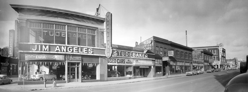 A Studebaker dealership located near Hennepin Avenue and Willow Street in Minneapolis, photographed in 1960.