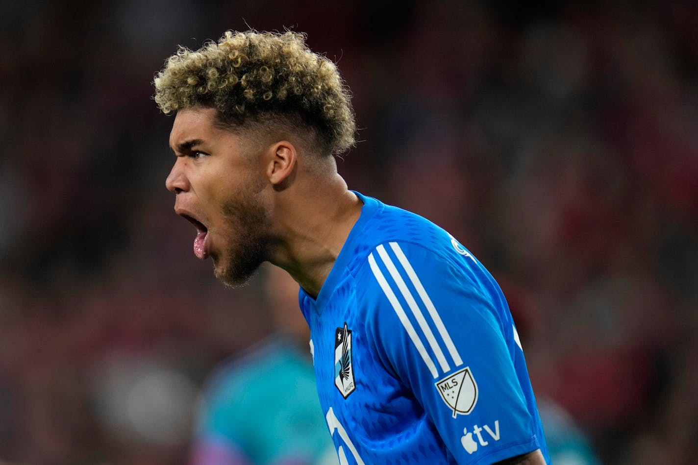 Minnesota United goalkeeper Dayne St. Clair celebrates a 1-0 victory over St. Louis City following an MLS soccer match Saturday, April 1, 2023, in St. Louis. (AP Photo/Jeff Roberson)