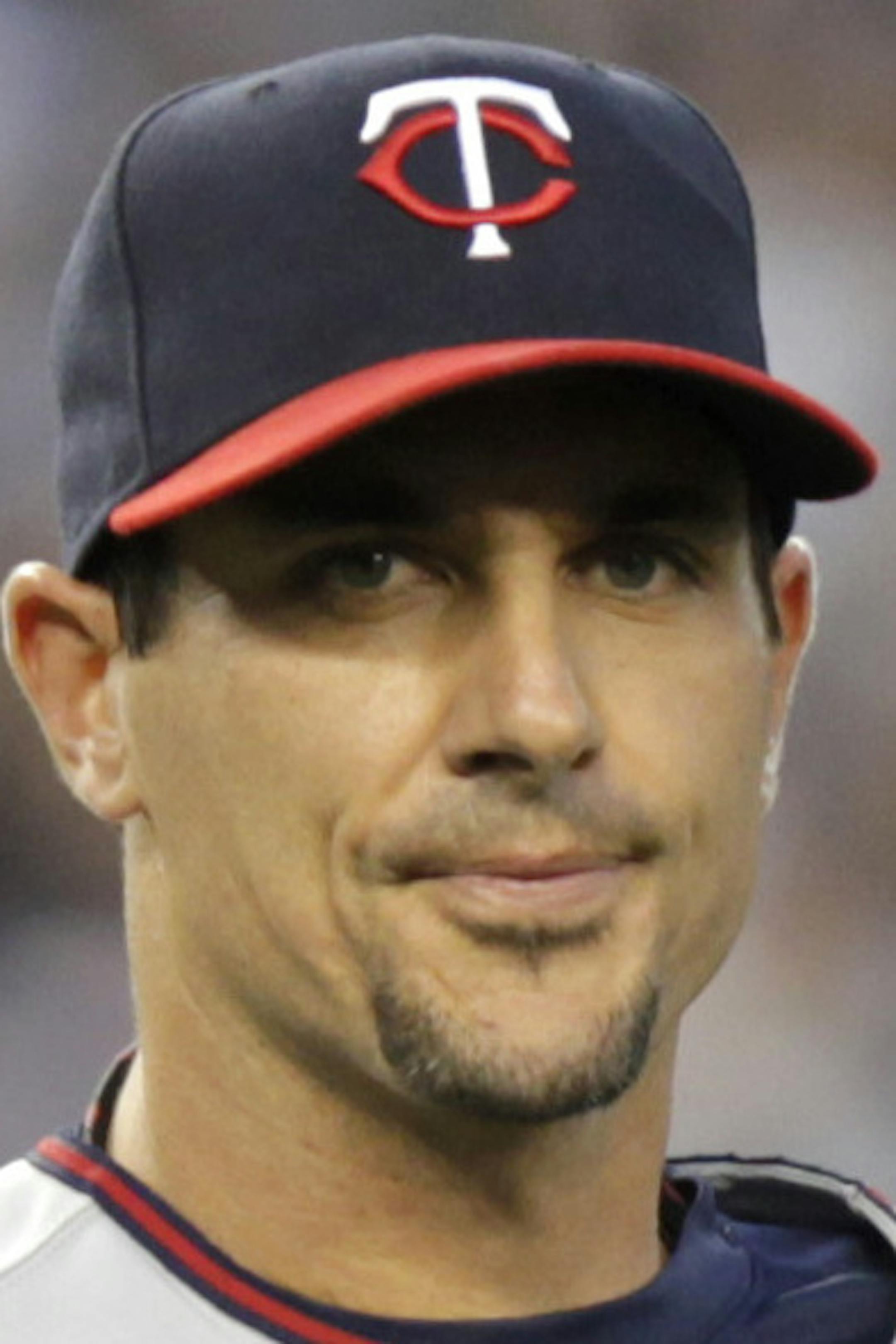 Minnesota Twins pitcher Carl Pavano reacts as New York Yankees' Alex Rodriguez reaches second base on an error during the first inning of a baseball game at Yankee Stadium in New York, Monday, April 16, 2012. (AP Photo/Seth Wenig)