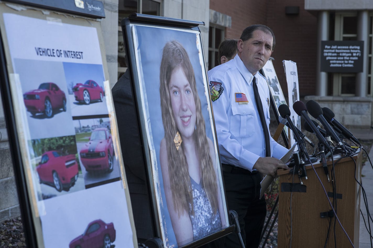 Barron County Sheriff' Chris Fitzgerald spoke to members of the media about 3 different vehicle of interest a 2008-2014 red/orange Dodge Challenger, 2006-2010 black Ford Edge, and a 2004-2010 black Acura MDZ during a press conference about 13-year-old Jayme Closs who has been missing since her parents were found dead in their home Monday October 22, 2018 in Barron, Wisconsin.