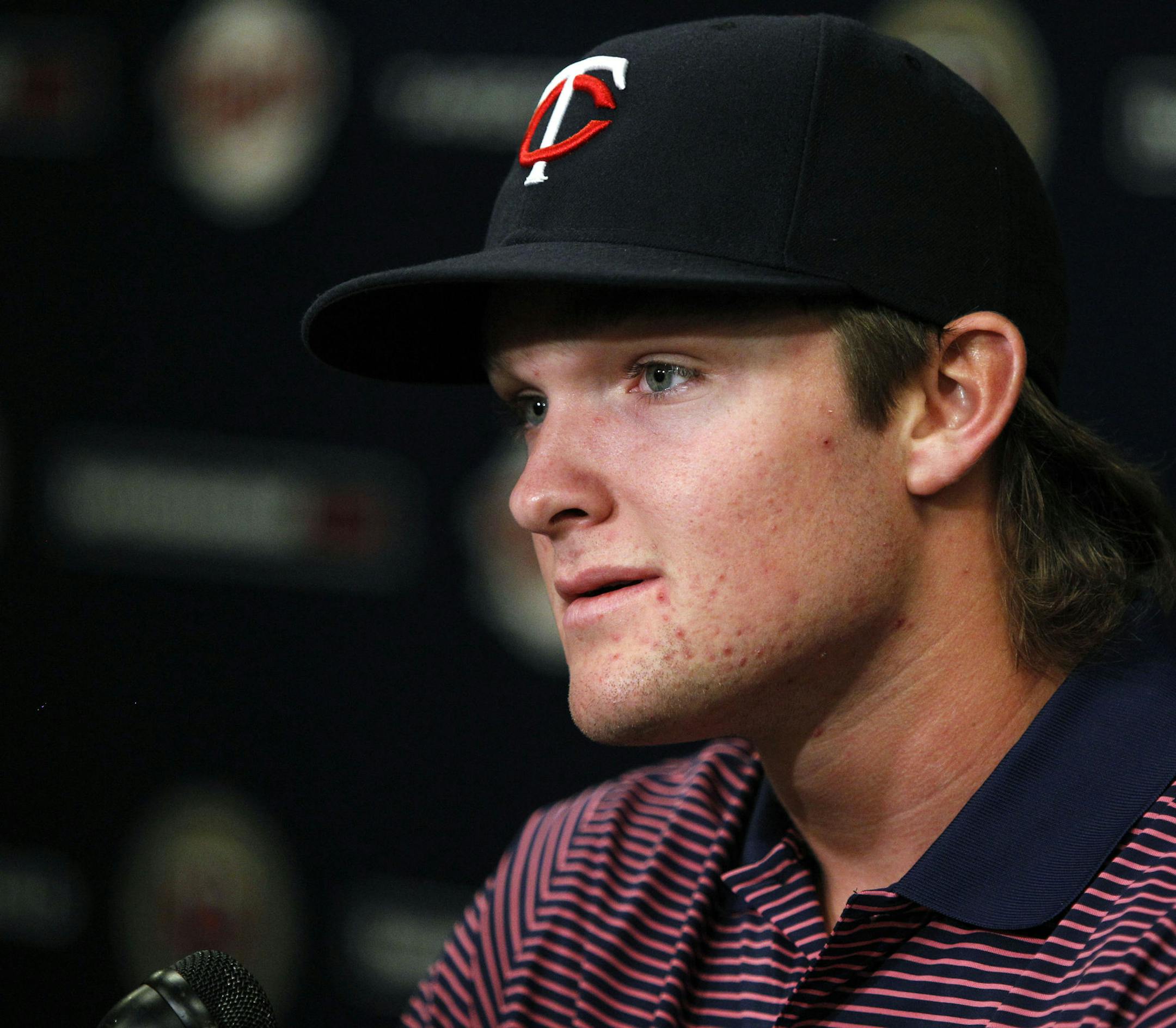 Minnesota Twins first-round draft pick Kohl Stewart, a right-handed pitcher from Houston, Texas, answers questions during a baseball news conference on Wednesday, June 19, 2013, in Minneapolis. Stewart was the fourth overall pick in the MLB first-year player draft. (AP Photo/Genevieve Ross) ORG XMIT: MNGR101