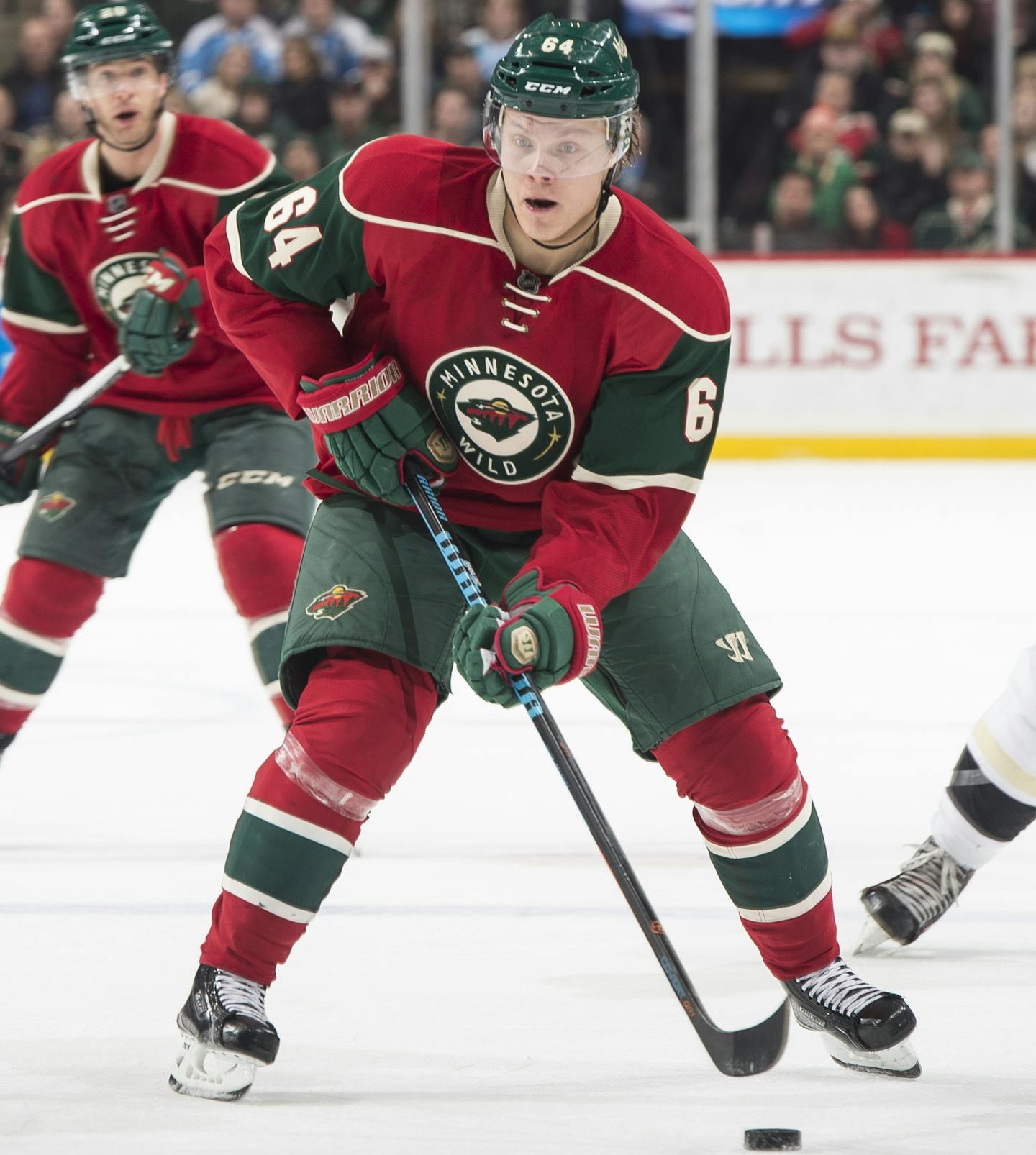 Minnesota Wild center Mikael Granlund (64) moved the puck down the ice against the Pittsburgh Penguins in the second period. ] (AARON LAVINSKY/STAR TRIBUNE) aaron.lavinsky@startribune.com The Minnesota Wild played the Pittsburgh Penguins on Saturday, Dec. 26, 2015 at Xcel Energy Center in St. Paul, Minn. ORG XMIT: MIN1512262207251734