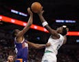 Kevin Durant of the Suns and Anthony Edwards of the Timberwolves went head-to-head in Sunday's regular-season finale at Target Center.
