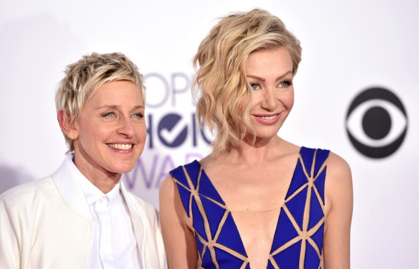 Ellen DeGeneres, left, and Portia de Rossi arrive at the People's Choice Awards at the Nokia Theatre on Wednesday, Jan. 7, 2015, in Los Angeles. (Photo by John Shearer/Invision/AP) ORG XMIT: INVW