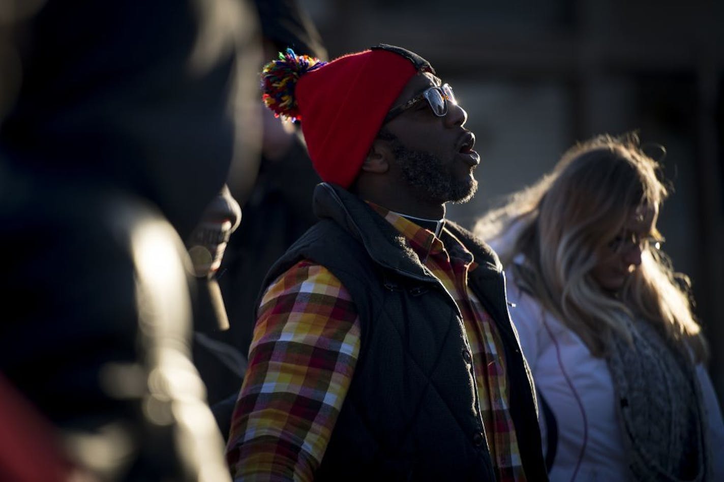 Pastor Danny Givens Jr. led part of Friday afternoon's vigil at Jamar Clark's memorial.